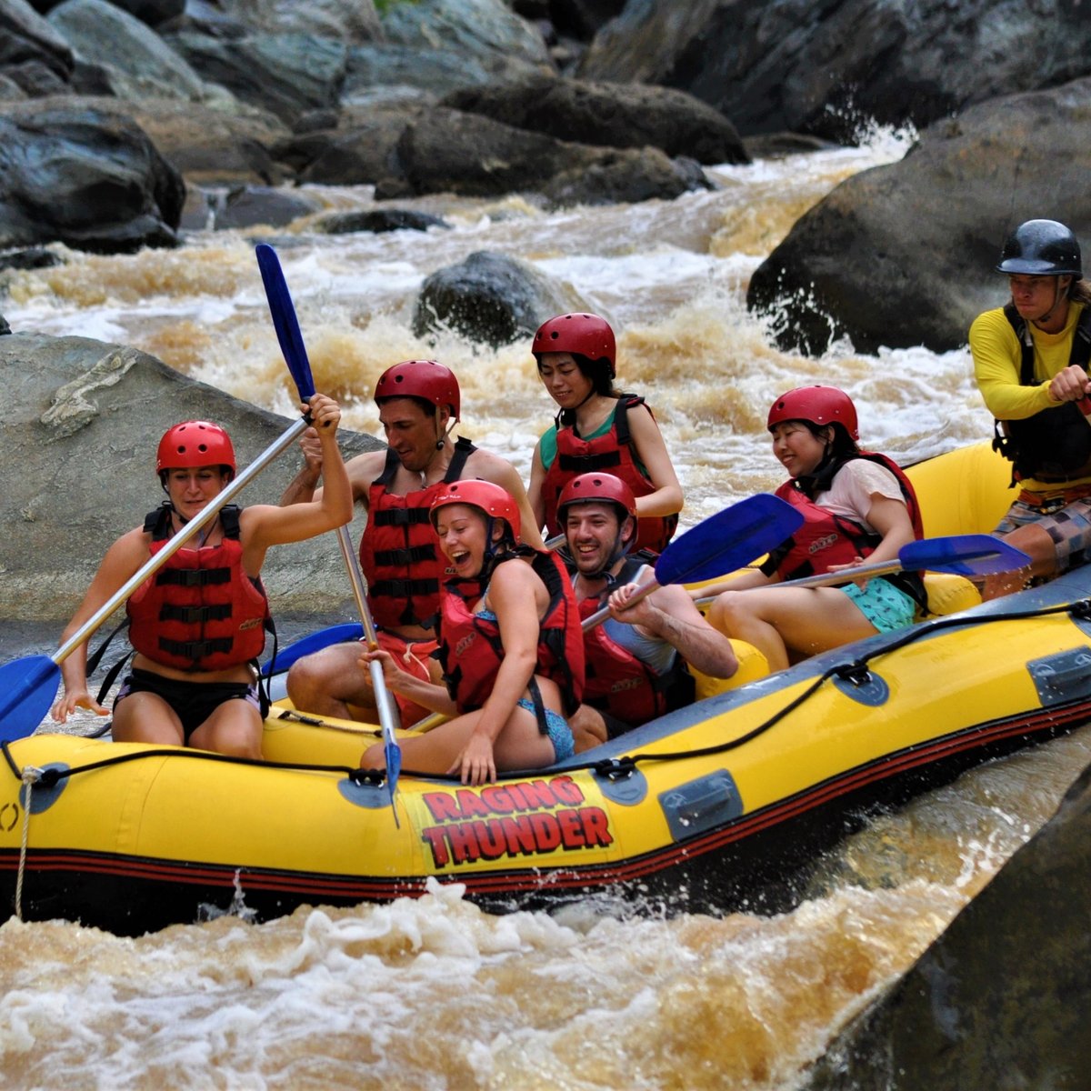 Cairns Adventure - Group with lifejackets and helmets on rubber raft