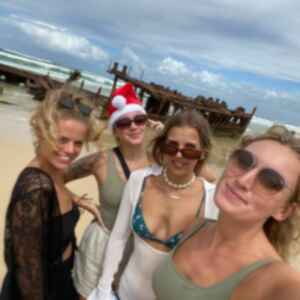 Group in Australia on Christmas with Christmas hat 