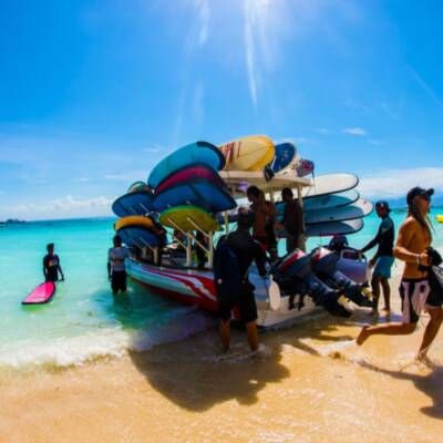 Bali Island Hopping - boat with colourful surf boards on