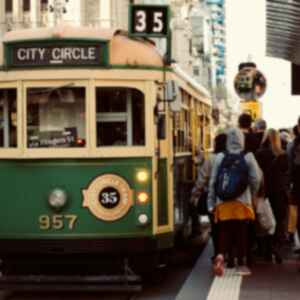 People waiting too board an old tram in Melbourne