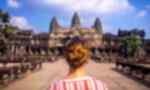 Traveller standing in front of Angkor Wat in Cambodia