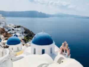 Blue churches in old town of Oia, santorini, greecce