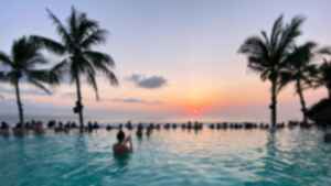 Travellers in pool near Seminyak Beach, Bali