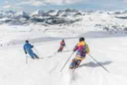 3 people skiing 