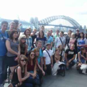 Gillian with fellow travellers in front of Sydney Harbour Bridge