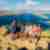 Travellers looking over viewpoint at Padar island in komodo islands