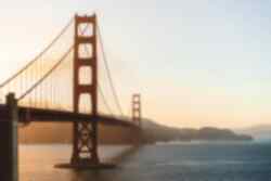 San Francisco bridge at dusk with water below