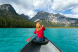 Person Canoeing in Lake in Banff National Park, Canada