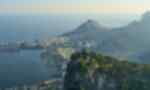 Aerial view of Christ the Redeemer and surrounding mountains and city