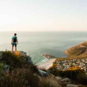 Traveller looking across Cape Town, Llandudno, Cape Town, South Africa
