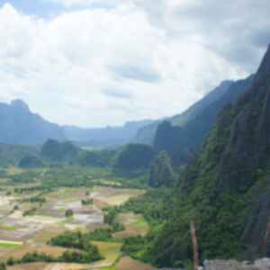 Mountains covered in lush greenery in Vang Vieng